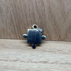 Silver Puzzle Piece Charm Pendant